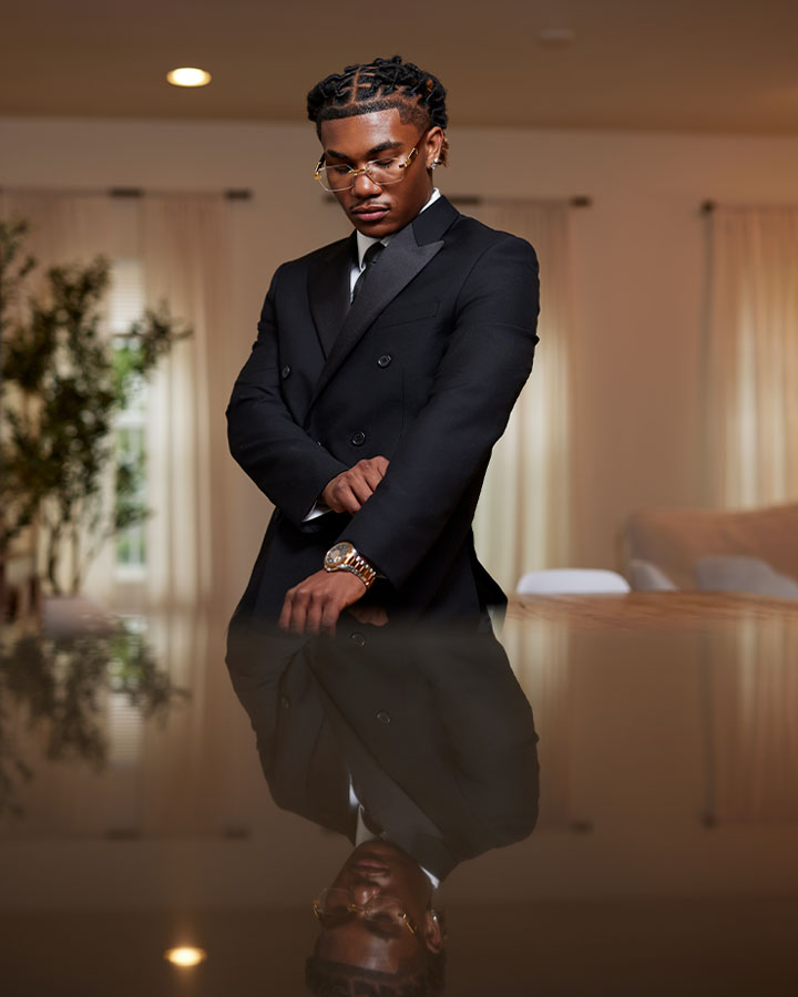 Young man in suit with reflection