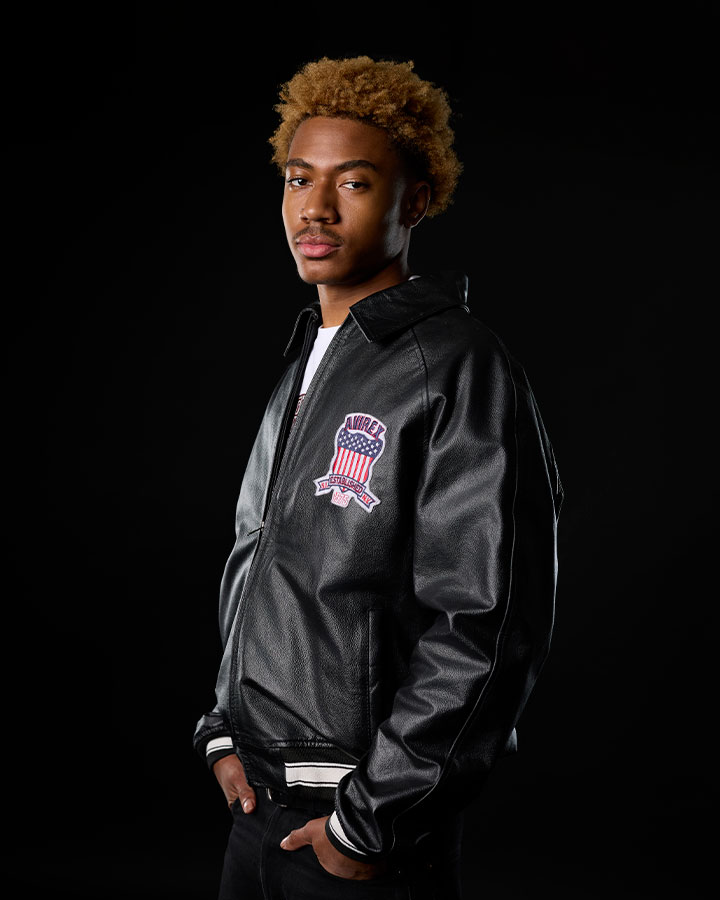 young man posing for senior portrait